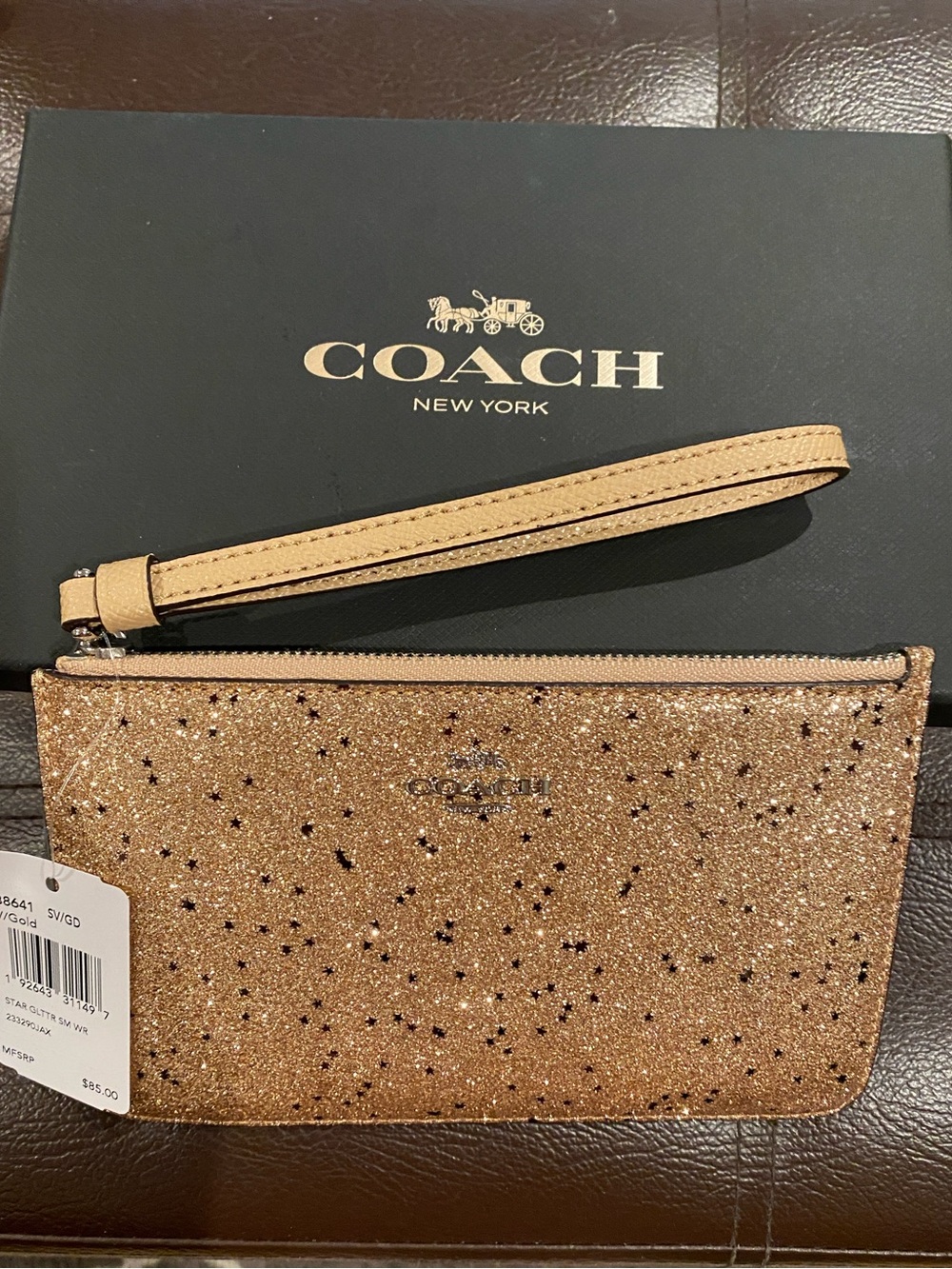 Coach Gold Glitter Star Wristlet. NWT MSRP $85.